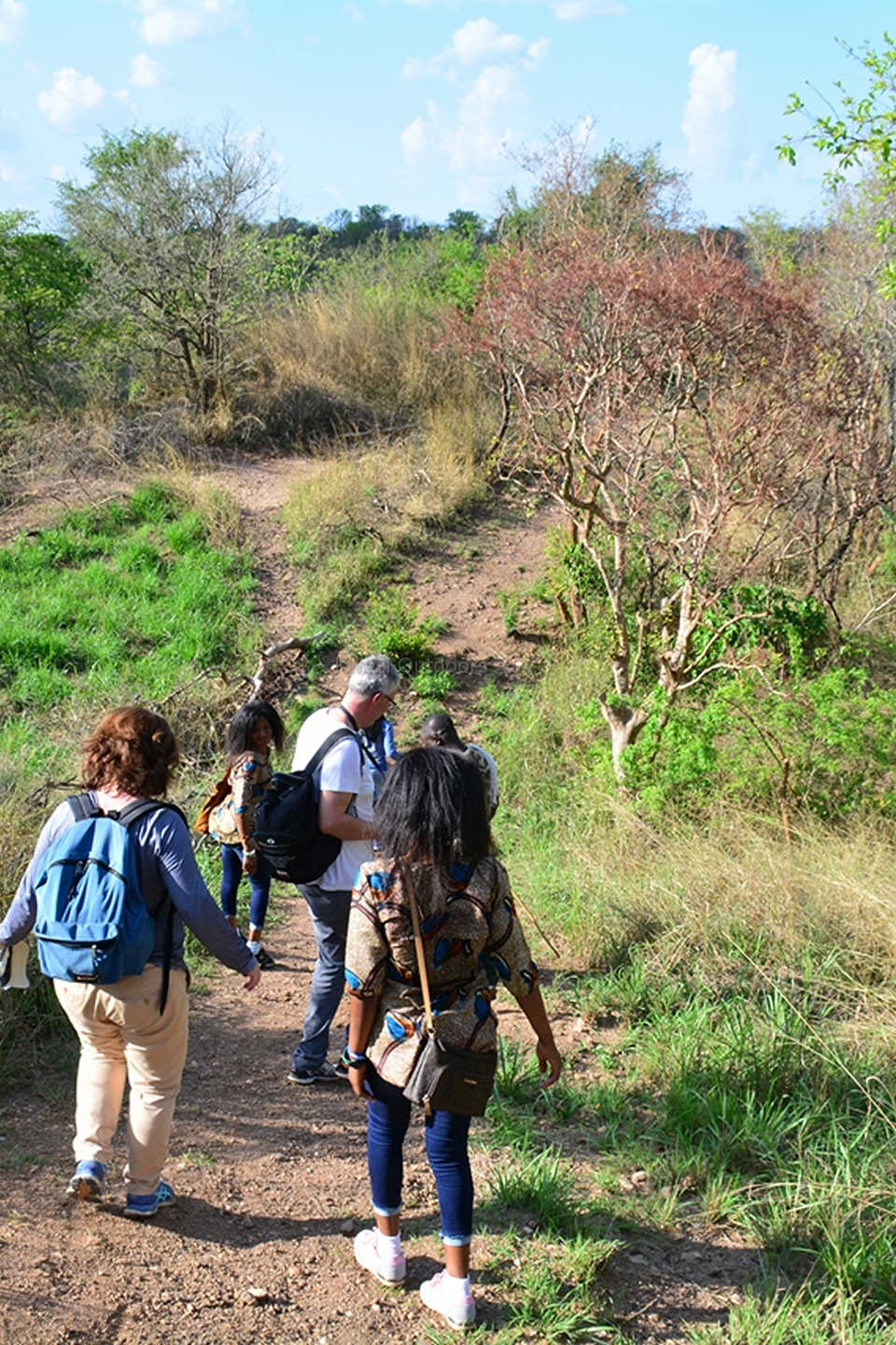 Hikers on Baker's Trail in the Murchison Falls National Park, Uganda - Kwezi Outdoors