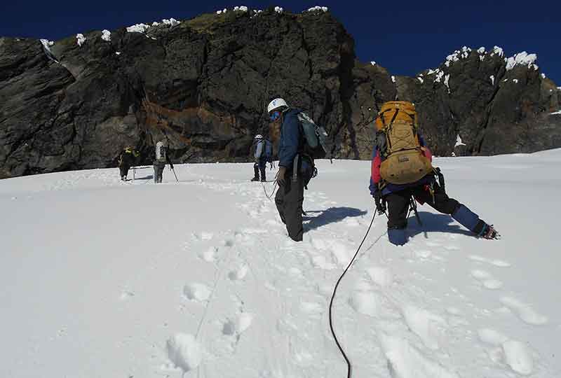 Climbers in deep Rwenzori snow+Uganda+travel_with+Kwez+Outdoors