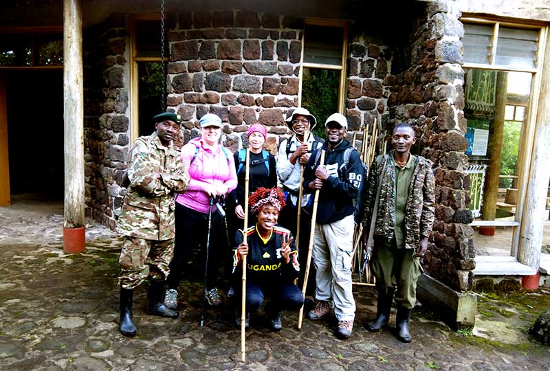 The climbing team with Uganda Wildlife Authority rangers at Mt. Mgahinga National Park headquarters before the hike