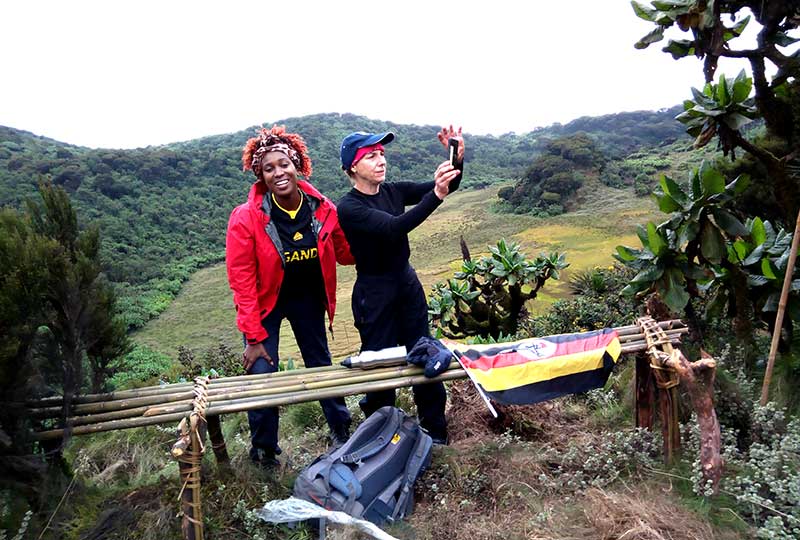 Lorna Paska and Pam at the summit of Mt. Mgahinga in Uganda. #KweziOutdoors